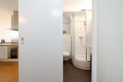 Ein Badezimmer in der Unterkunft Giny's Beach Appartement