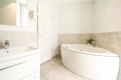 Ein Badezimmer in der Unterkunft Promenadenvilla 03 Wohnung 07