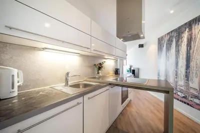 Küche/Küchenzeile in der Unterkunft Promenadenvilla 03 Wohnung 01