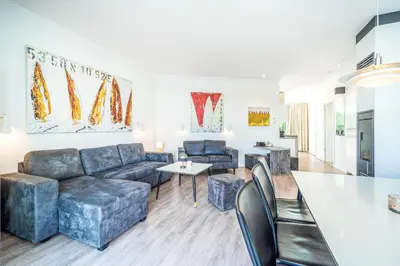Ein Sitzbereich in der Unterkunft Promenadenvilla 03 Wohnung 11