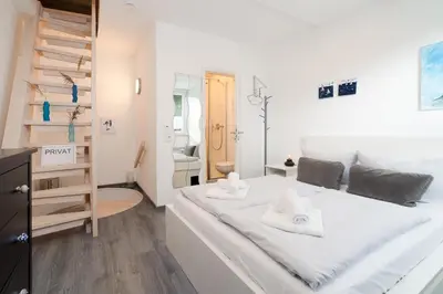 Ein Bett oder Betten in einem Zimmer der Unterkunft Ferienwohnung 