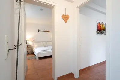 Ein Bett oder Betten in einem Zimmer der Unterkunft Ferienwohnung 