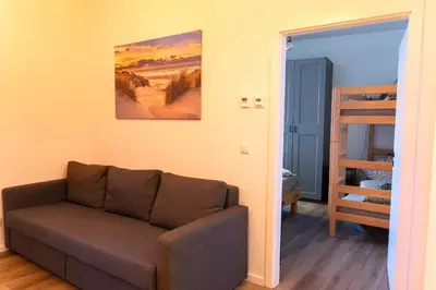 Ein Sitzbereich in der Unterkunft New central 2-3 room apartments with parking near train station & casino