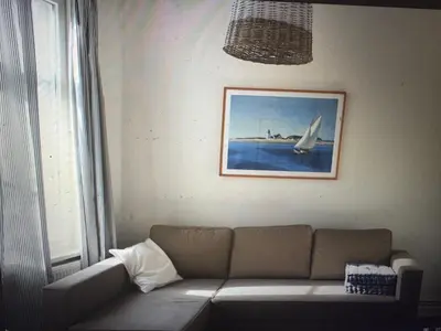 Ein Sitzbereich in der Unterkunft Kapitänshaus