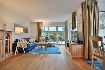 Ein Sitzbereich in der Unterkunft Haus Sonnenpark Appartement 03