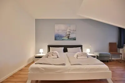 Ein Bett oder Betten in einem Zimmer der Unterkunft Appartements Windrose Haus Windrose Appartement 20