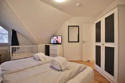 Ein Bett oder Betten in einem Zimmer der Unterkunft Appartements Windrose Haus Windrose Appartement 20