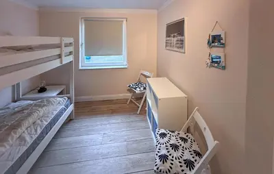 Ein Bett oder Betten in einem Zimmer der Unterkunft Amazing Home In Timmendorfer Strand Ot