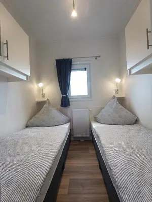 Ein Bett oder Betten in einem Zimmer der Unterkunft Black Pearl