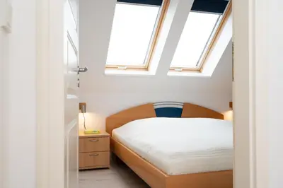 Ein Bett oder Betten in einem Zimmer der Unterkunft Hanseatenresidenz App 31