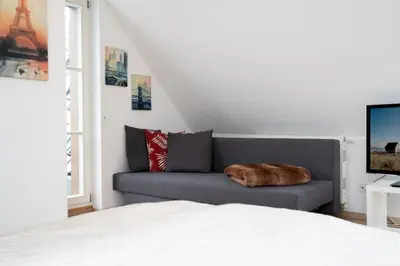 Ein Bett oder Betten in einem Zimmer der Unterkunft Hanseatenresidenz App 31