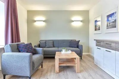 Ein Sitzbereich in der Unterkunft Haus SeeZeit Appartement 04