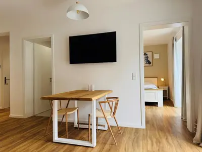 TV/Unterhaltungsangebot in der Unterkunft Salt & Sand Haffkrug Salt & Sand Wohnung Sand
