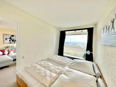 Ein Bett oder Betten in einem Zimmer der Unterkunft Panoramic Sierksdorf Bayview
