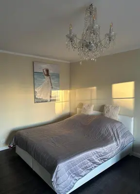 Ein Bett oder Betten in einem Zimmer der Unterkunft Poststrasse 2