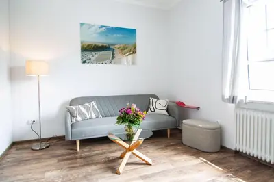 Ein Sitzbereich in der Unterkunft Gästehaus Daheim - Appartement 06