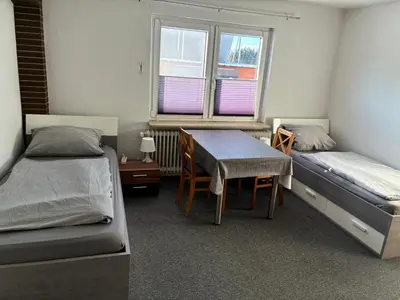 Ein Bett oder Betten in einem Zimmer der Unterkunft Freundliche Monteurwohnung
