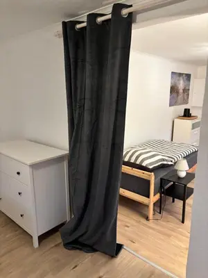 Ein Bett oder Betten in einem Zimmer der Unterkunft Schlafen in Lübeck