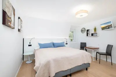 Ein Bett oder Betten in einem Zimmer der Unterkunft Strandhus Matrose