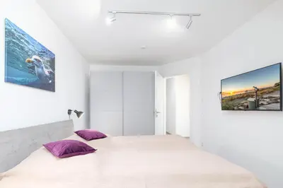Ein Bett oder Betten in einem Zimmer der Unterkunft Haus FRIEDA, Bude A