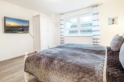 Ein Bett oder Betten in einem Zimmer der Unterkunft 2 Seasons, High Five