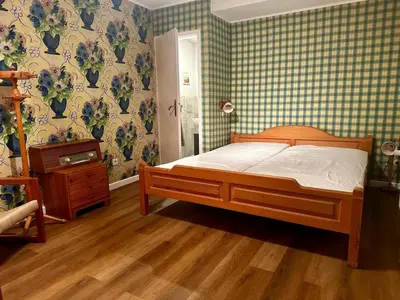 Ein Bett oder Betten in einem Zimmer der Unterkunft Ferienidyll Mariett