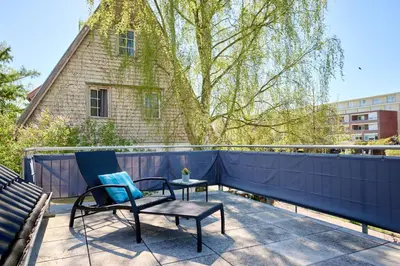 Ein Balkon oder eine Terrasse in der Unterkunft House family idyll Moba-travel