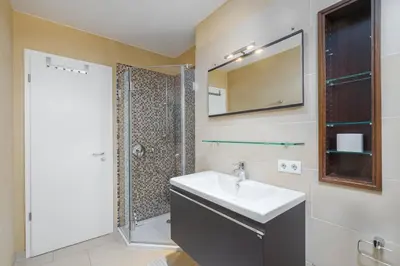 Ein Badezimmer in der Unterkunft Wohnen am Meer App 18