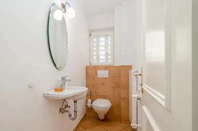 Ein Badezimmer in der Unterkunft Gästehaus Nina #4
