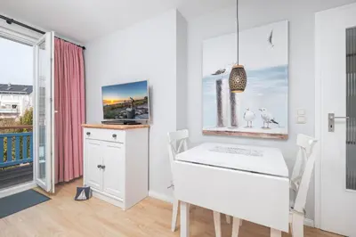 Ein Bett oder Betten in einem Zimmer der Unterkunft Haus Schmökel, App Möwe