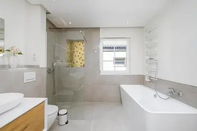 Ein Badezimmer in der Unterkunft SunSide Apartment #5