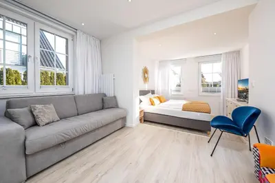Ein Sitzbereich in der Unterkunft SunSide Apartment #1