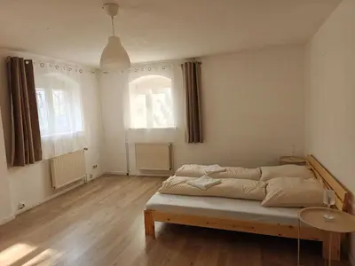 Ein Bett oder Betten in einem Zimmer der Unterkunft Cozy apartment, central & child-friendly