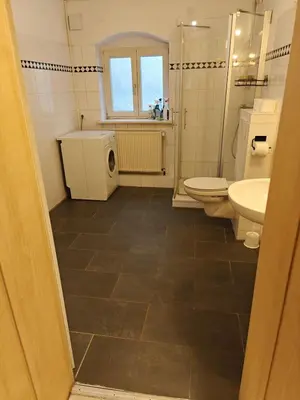 Ein Badezimmer in der Unterkunft Cozy apartment, central & child-friendly