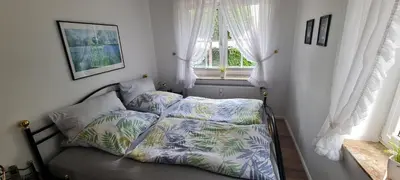 Ein Bett oder Betten in einem Zimmer der Unterkunft Ferienwohnung Rahn Apartment 1