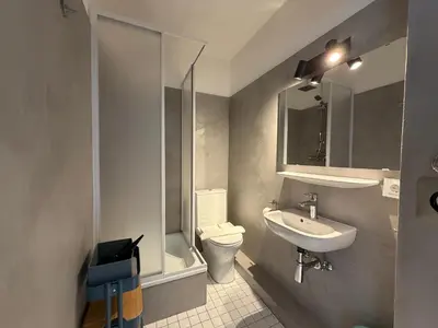 Ein Badezimmer in der Unterkunft Beachfront Studio - 1 Strandreihe