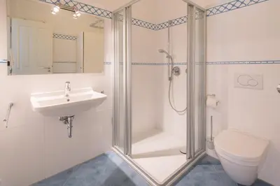 Ein Badezimmer in der Unterkunft Seebadvilla