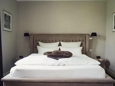 Ein Bett oder Betten in einem Zimmer der Unterkunft Herrenhaus Gut Neuruppersdorf