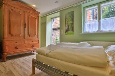 Ein Bett oder Betten in einem Zimmer der Unterkunft Ferienwohnung Coco