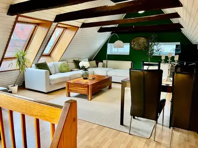 Ein Sitzbereich in der Unterkunft Ferienwohnung Coco