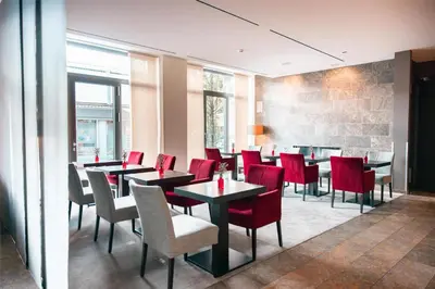 Ein Sitzbereich in der Unterkunft ATLANTIC Hotel Lübeck