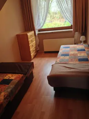 Ein Bett oder Betten in einem Zimmer der Unterkunft Hof Beuck