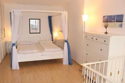 Ein Bett oder Betten in einem Zimmer der Unterkunft Apartmentvermittlung Mehr als Meer - Objekt 7