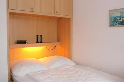 Ein Bett oder Betten in einem Zimmer der Unterkunft Apartmentvermittlung Mehr als Meer - Objekt 54