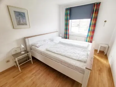 Ein Bett oder Betten in einem Zimmer der Unterkunft Apartmentvermittlung Mehr als Meer - Objekt 16