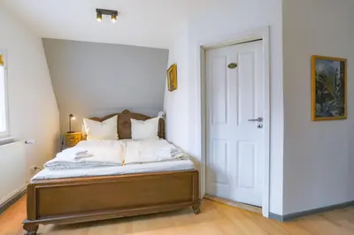 Ein Bett oder Betten in einem Zimmer der Unterkunft Apartments im Einhornhaus