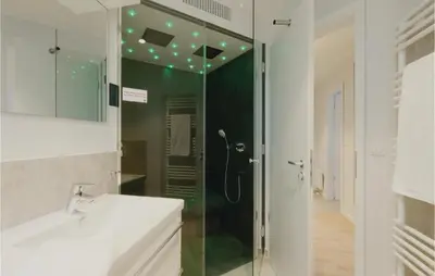 Ein Badezimmer in der Unterkunft Dünenvilla 9, Whg 3