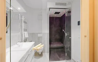 Ein Badezimmer in der Unterkunft Dünenvilla 17, Whg 1