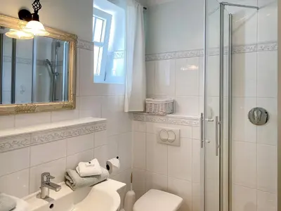 Ein Badezimmer in der Unterkunft Villa Hansa am Meer