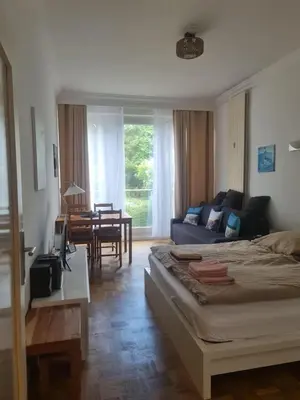 Ein Sitzbereich in der Unterkunft Pärchenwohnung Strandallee